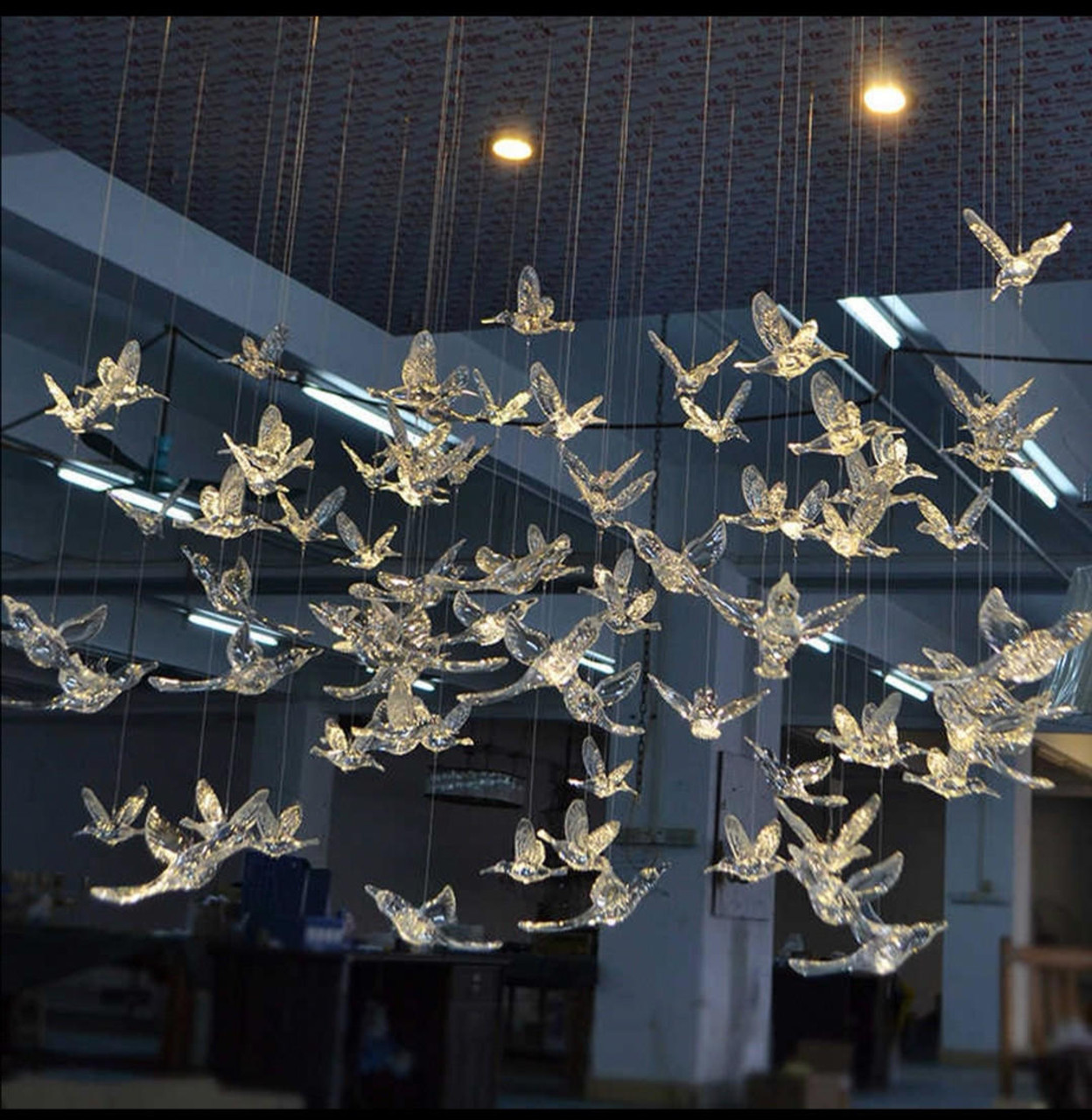 chandelier with birds and crystals