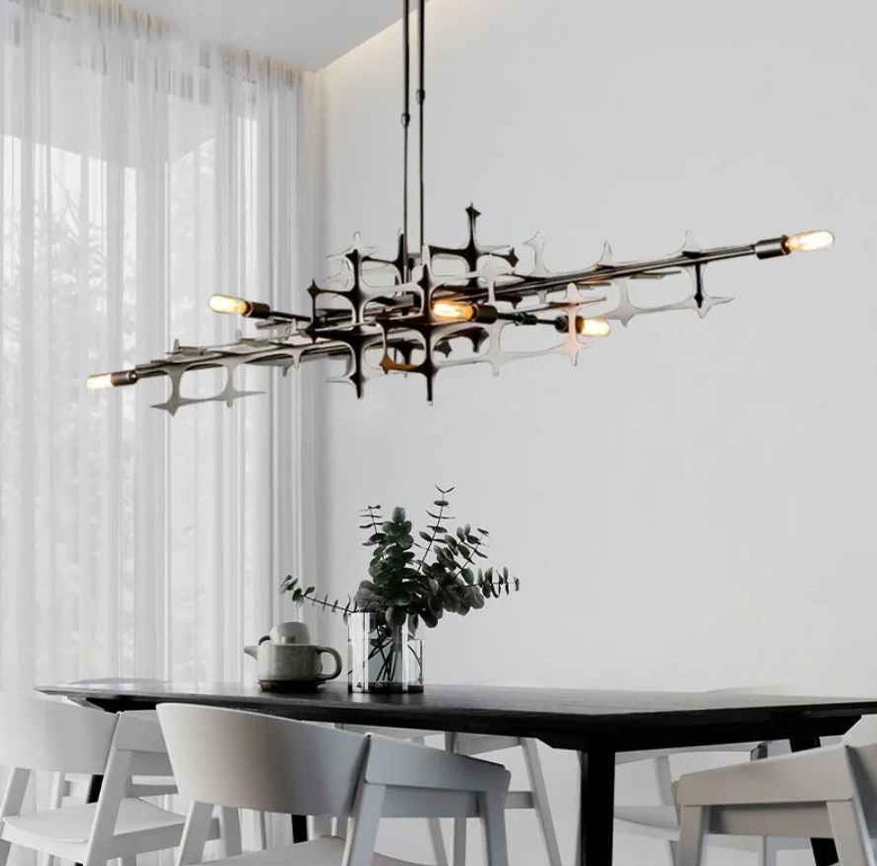 light fixtures over dining table