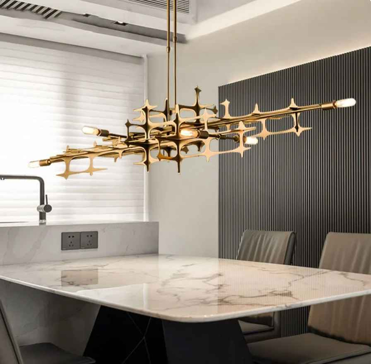 swag chandelier over dining table